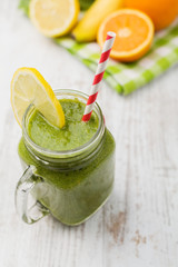 Vegetable and fruit cocktail, served in a jar, with fresh citrus
