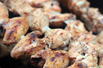 Chicken on the grill to cook