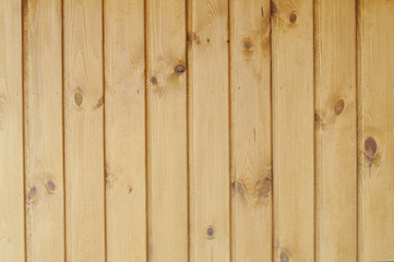Fototapeta premium A wooden rail, wall, background.