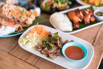 chitterlings grilled on wood table