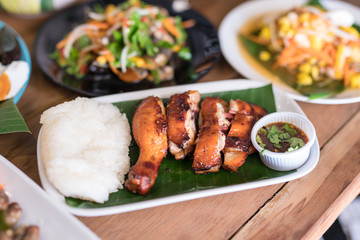 tasty grilled chicken wings on a white dish
