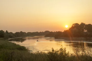 Tuinposter zonsondergang op de rivier © mironovm