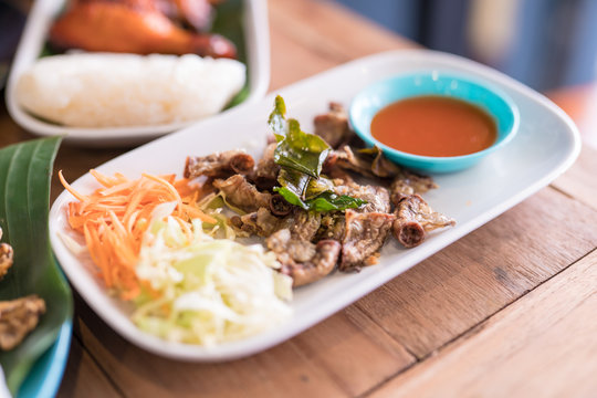 chitterlings grilled on wood table