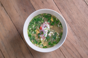 vegetable Clear Soup on wood table