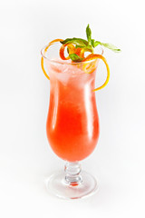 Orange cocktail with mint in a glass isolated on white background