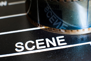 Scene label on movie clapper and film reel