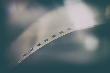 35 mm film reel extreme close up, movie symbol