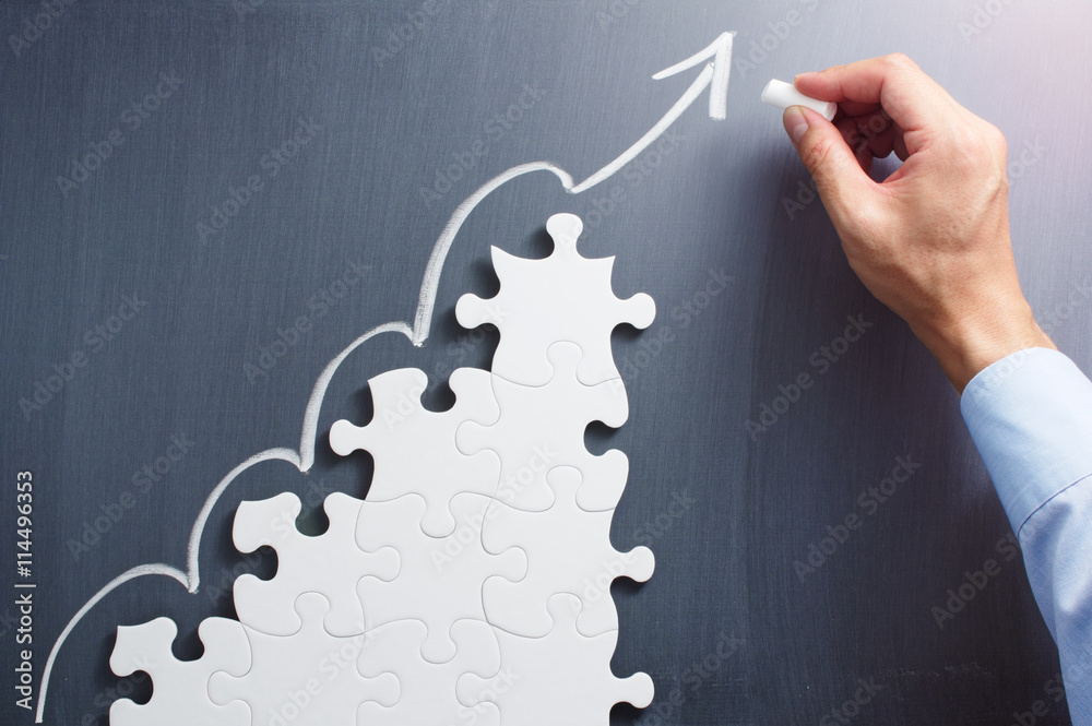Poster steps shaped jigsaw puzzle. drawing arrow on blackboard. concept image of making business plan.