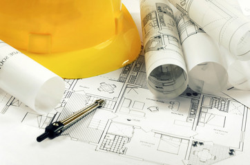Architectural project and yellow helmet