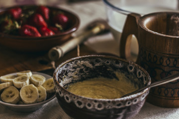 Pancake batter with berry jam and fruits