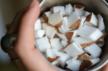 Coconut cubes in a bowl