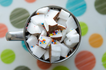 Coconut cubes in a bowl