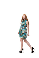 Young pregnant woman isolated on white