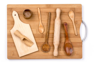Flat lay of kitchen wooden utensils on the cutting board