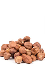 Bunch of hazelnuts over white background with copy space