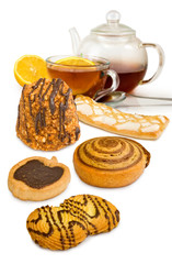 Image of cookies, cup of tea and lemon close up