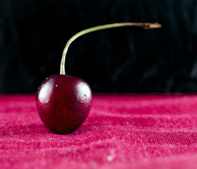 Cherry over black