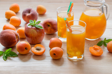 Apricot peach apple juice with ice.