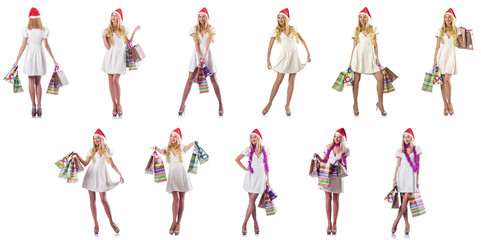 Woman with shopping bags isolated on white