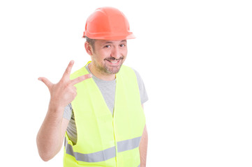 Professional constructor doing number three sign