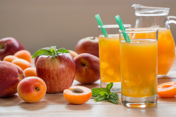 Apricot peach apple juice with ice.