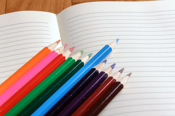 Obraz premium Blank notebook with color pencil. Education concept.