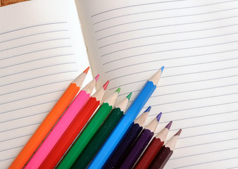 Blank notebook with color pencil. Education concept.