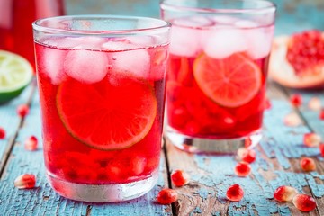 Fototapeta na wymiar homemade lemonade with pomegranate, mint and lime