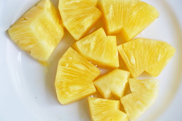 pineapple slice on white plate
