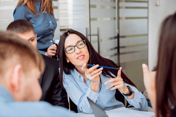 Team meeting. Discussion of business strategy.