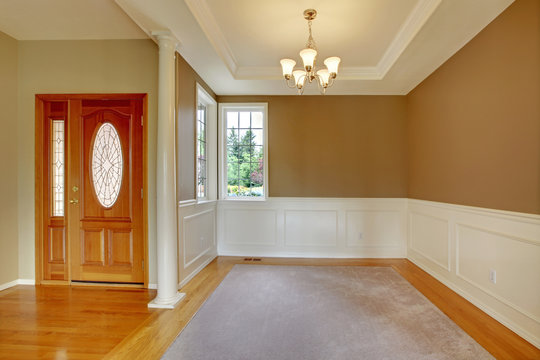 Nice Bright Entry Way To Home With Hardwood Floor