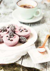 raw vegan berry cheesecake with coconut, portioned