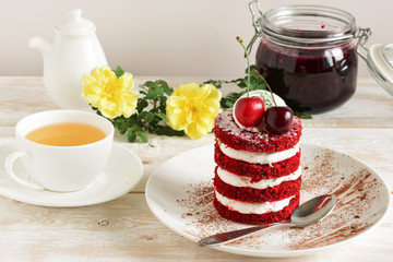red cake with cherry