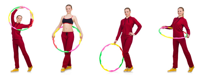 Woman doing exercises with hula hoop
