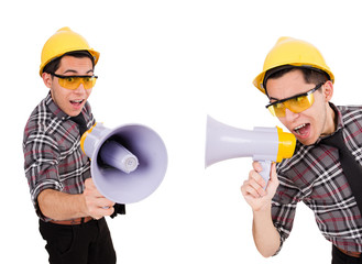 Young construction worker with loudspeaker isolated on white