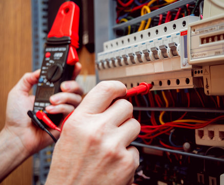 Electrical equipment. Tester in the hands.