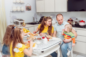 Cheerful family having lunch