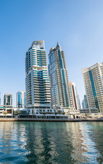 Fototapeta na wymiar Buildings and river of Dubai Marina, UAE