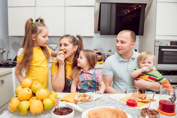 Cheerful family having lunch