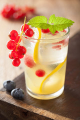 summer lemonade with berry and lemon