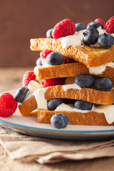 french toasts with creme fraiche and berries for breakfast