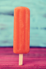 orange flavored ice pop