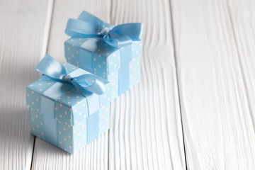 Two blue gift boxes