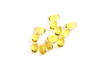 Yellow Nutrient particles isolated on white 