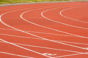 Running track in stadium, close-up, backgraund