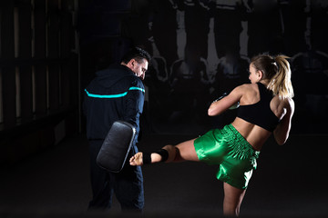 Fototapeta na wymiar Kickboxing female training