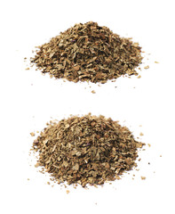 Pile of dried basil seasoning isolated