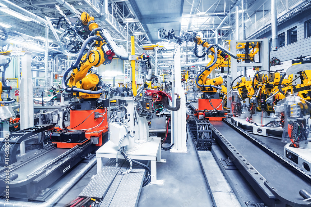 Wall mural robotic arms in a car plant