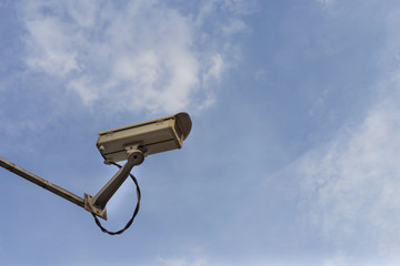 close circuit television camera (CCTV) for security purposes with blue sky