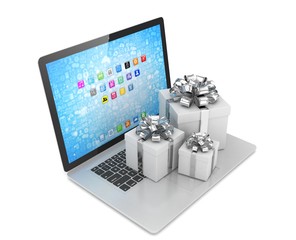 Fototapeta premium Gift box with ribbon bow on laptop keyboard. 3d rendering.